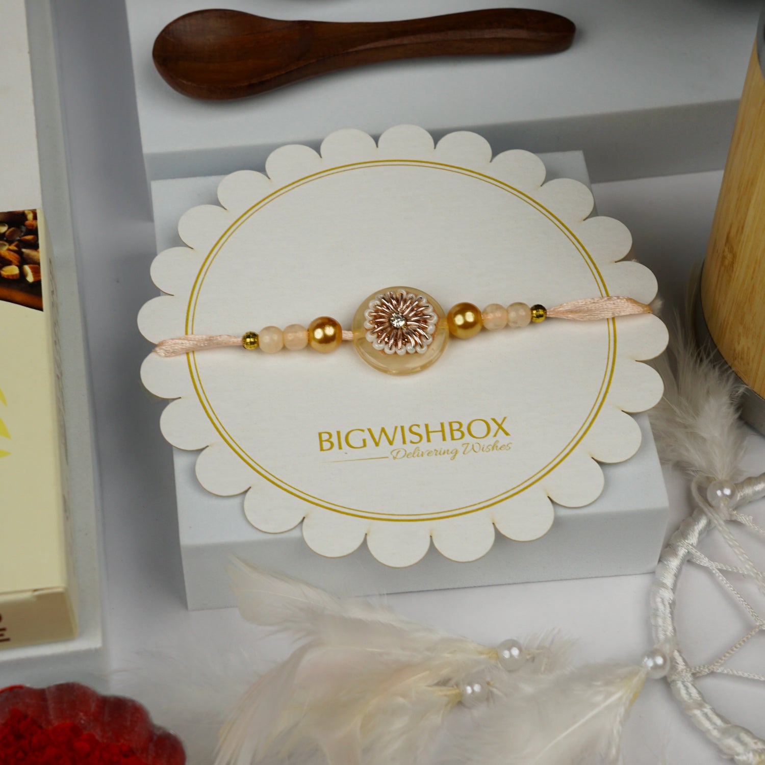 Elegant Pearl & Gold Rakhi