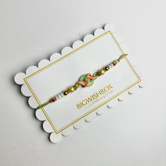 Graceful Pearl & Enamel Rakhi