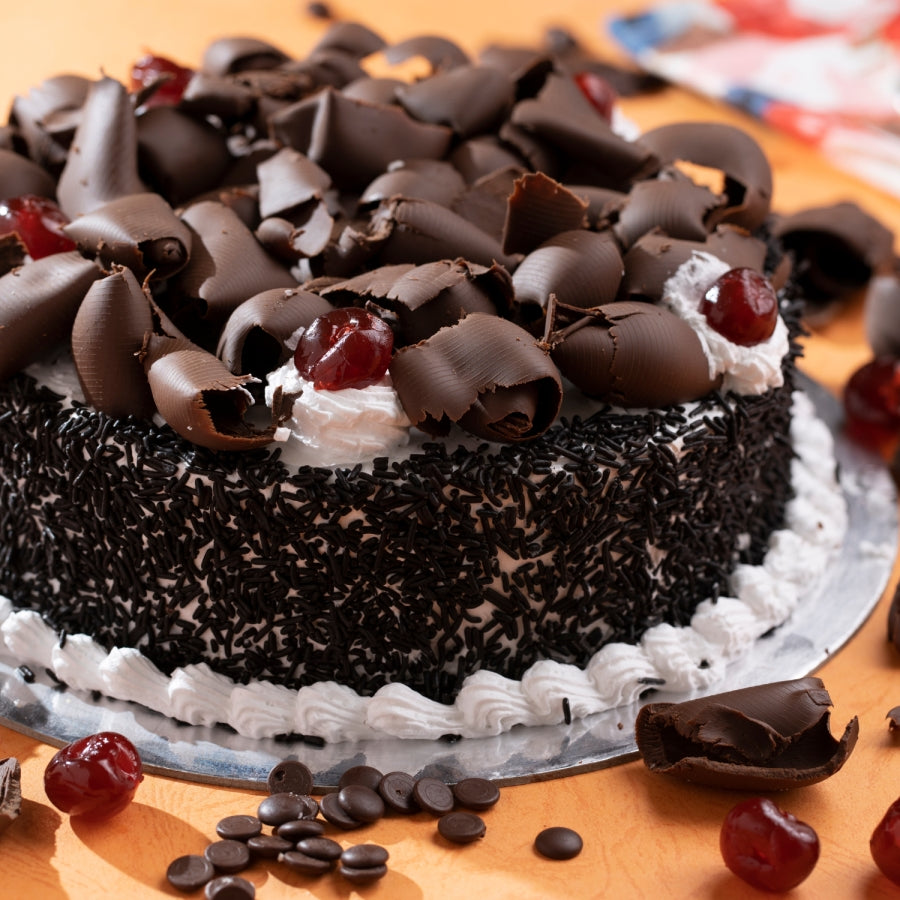 Decadent Black Forest Cake with Abundant Chocolate Flakes