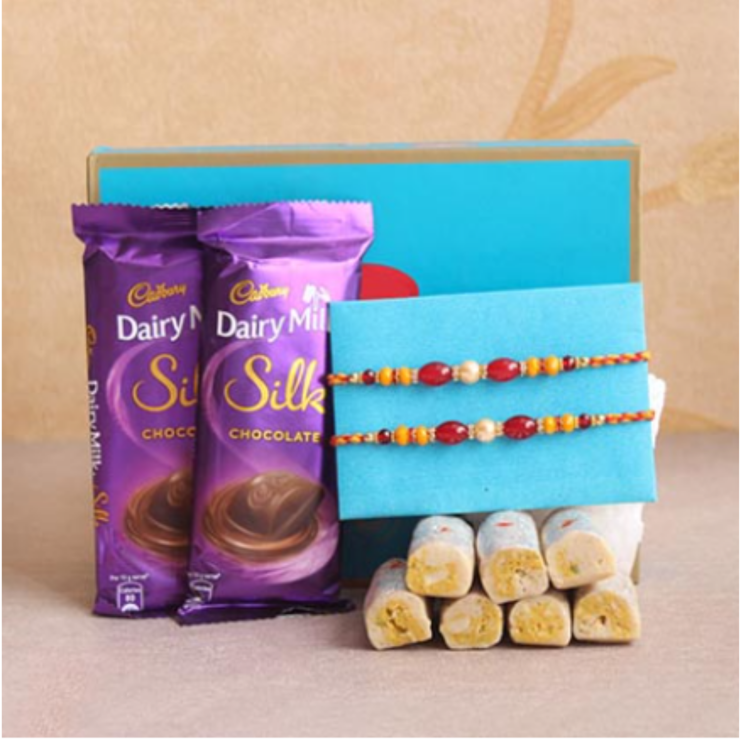 "Enchanting Raksha Bandhan: Bigwishbox Rakhi and Sweets Delight Combo"